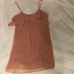 Size XS but could also fit a S - Peach color